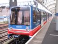 DLR train headed by B2K stock car 96 at Tower Gateway station